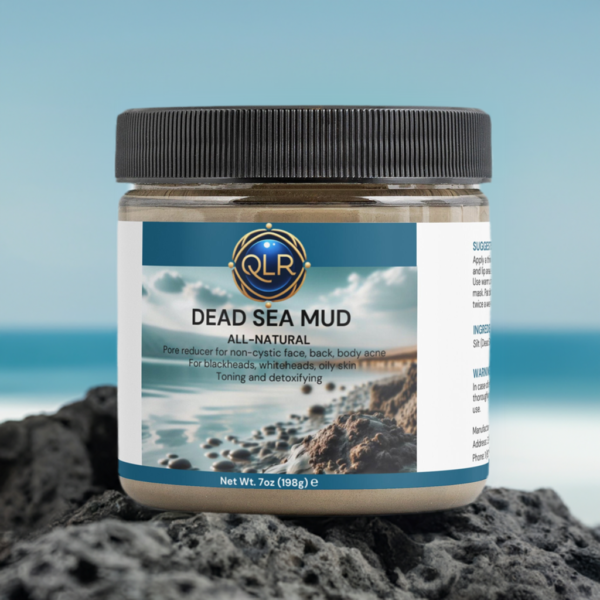a jar of dead sea mud sitting on the beach